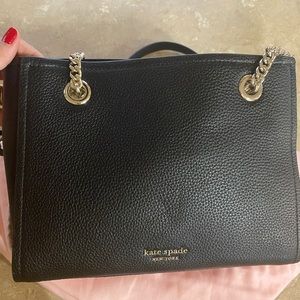small kate spade tote in black with silver chain.
